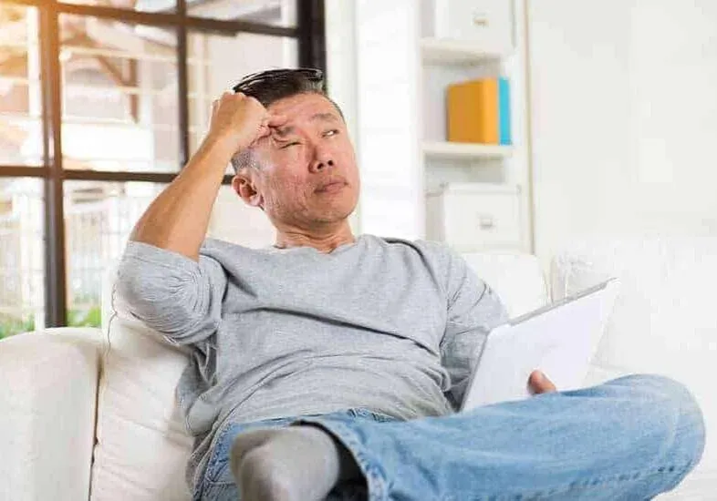 Whiplash & Auto Accidents 12 a man with headache due to whiplash injury in Columbus Ohio