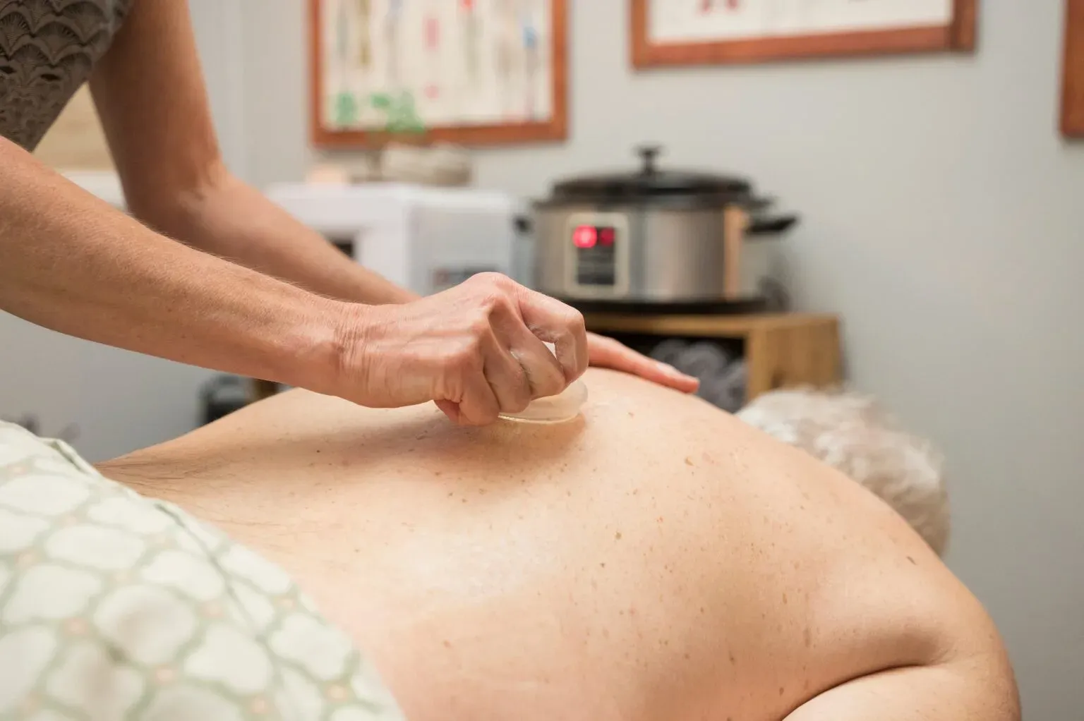 a patient receiving back massage therapy from an Active Edge massage therapist in Columbus Ohio